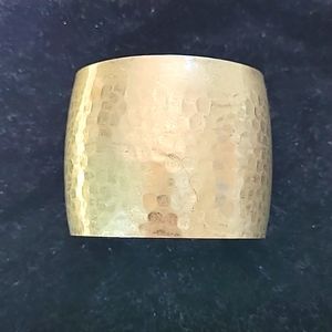 Womens hammered metal cuff bracelet. OS. Brass tan color.
